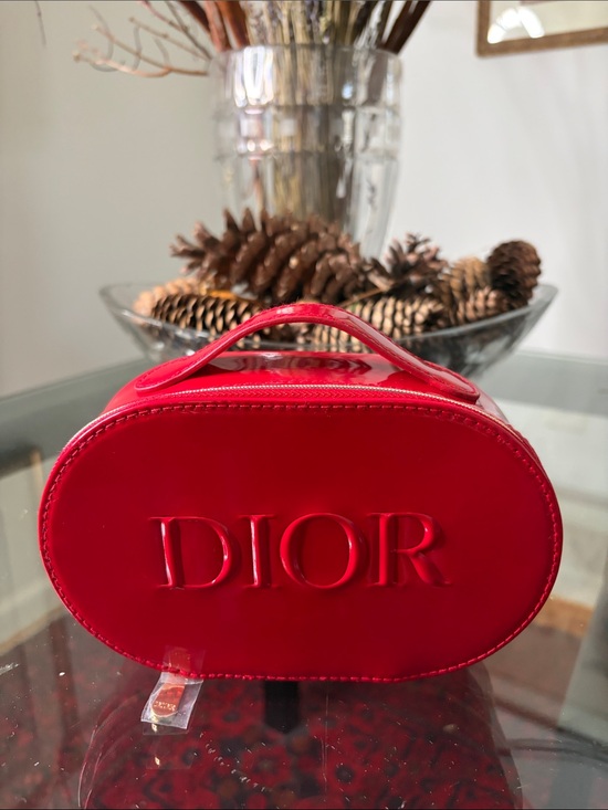 Dior Handbags - Dior beauty Glossy Red Oval Vanity Case with Raised Logo
